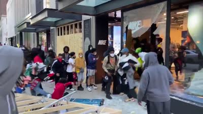 Saqueo tienda Nike disturbios EEUU